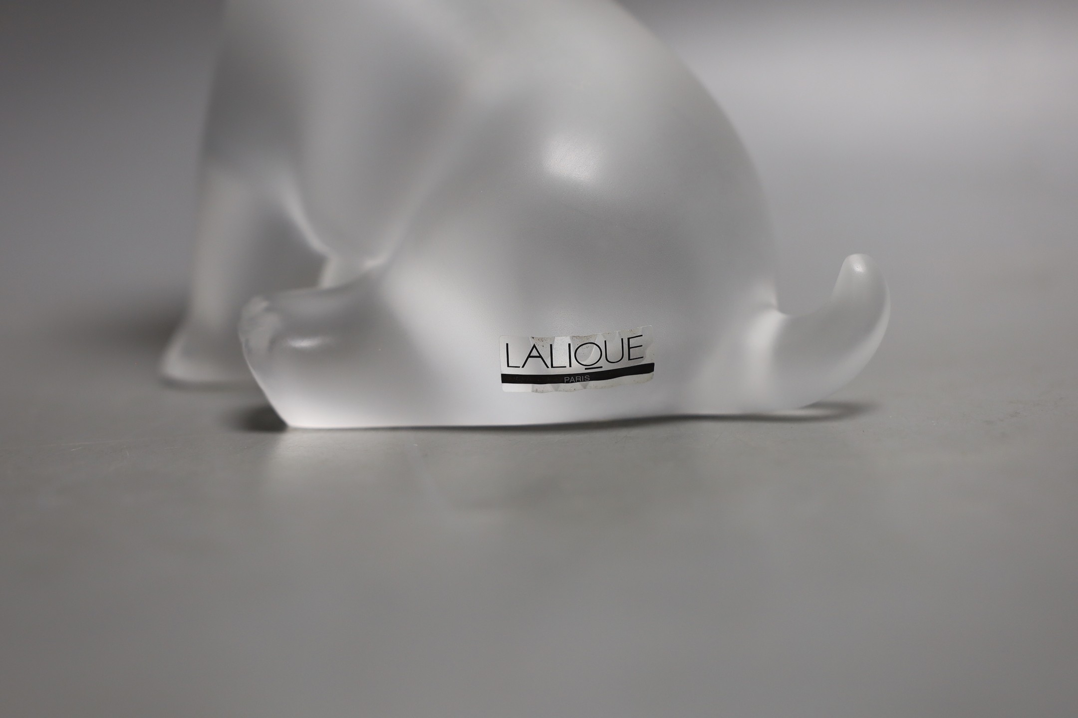 A Lalique dog, base etched ‘Lalique R France’, 13cm